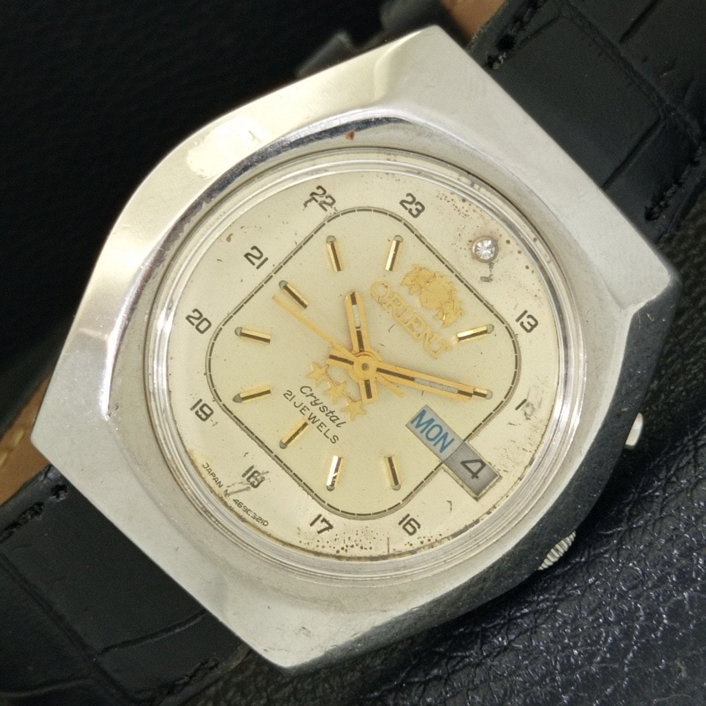Vintage 1990 Orient Automatic Mens Silver Watch WDaydate  Gold Accents